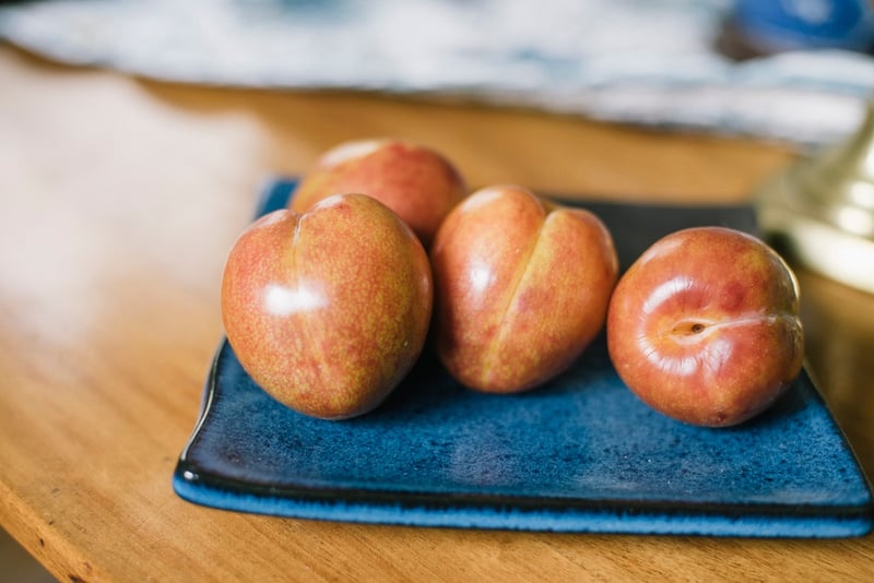 Organic Pluots on Plate | Boston Organics