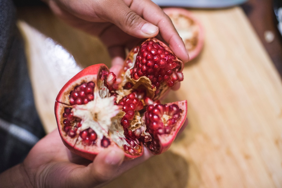 Score your pomegranate and break apart, following the white membranes. 