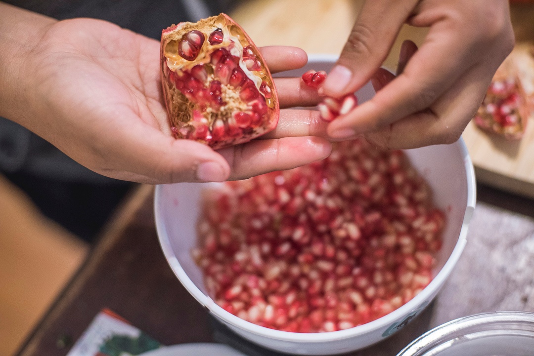 Quarter your pomegranate and remove the seeds. 