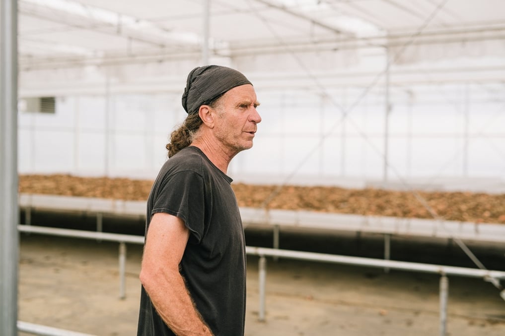 Chipper Sullivan in Atlas Farm's Greenhouse