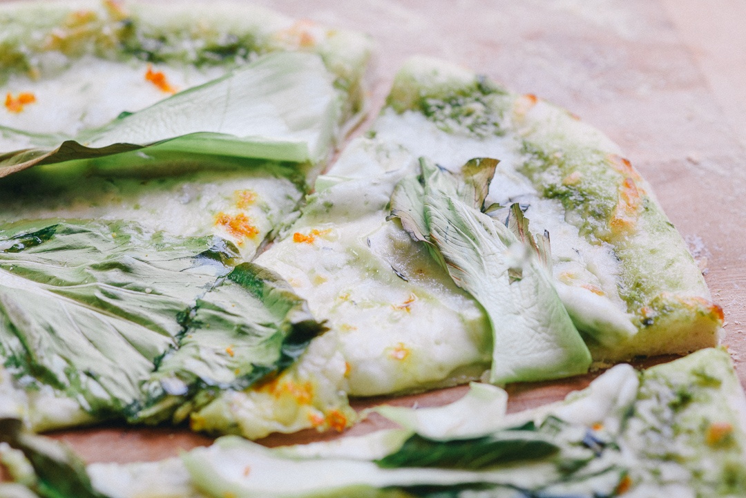 Top your Kohlrabi and Bok Choy Pizza with some delicious baby greens!
